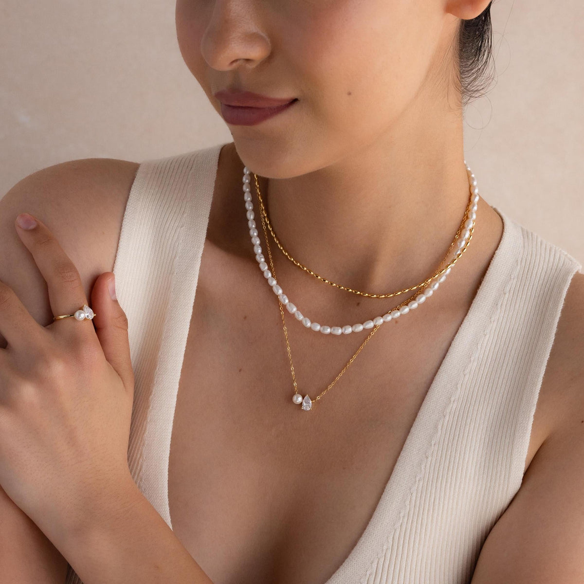 Colar de pérolas e diamantes