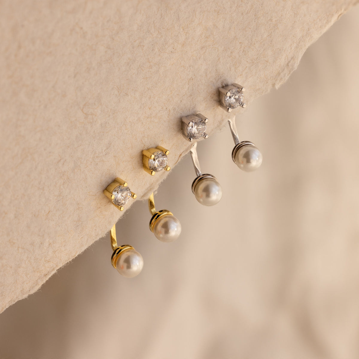 Brincos com pérolas e diamantes