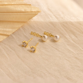 Brincos com pérolas e diamantes