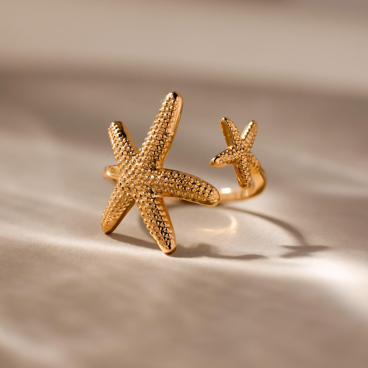 Anel de estrela-do-mar duplo aberto