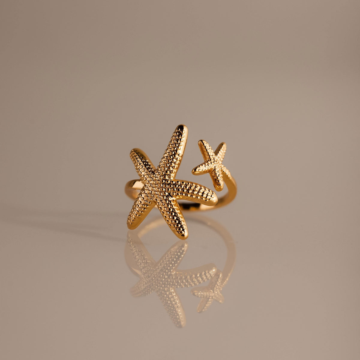 Anel de estrela-do-mar duplo aberto