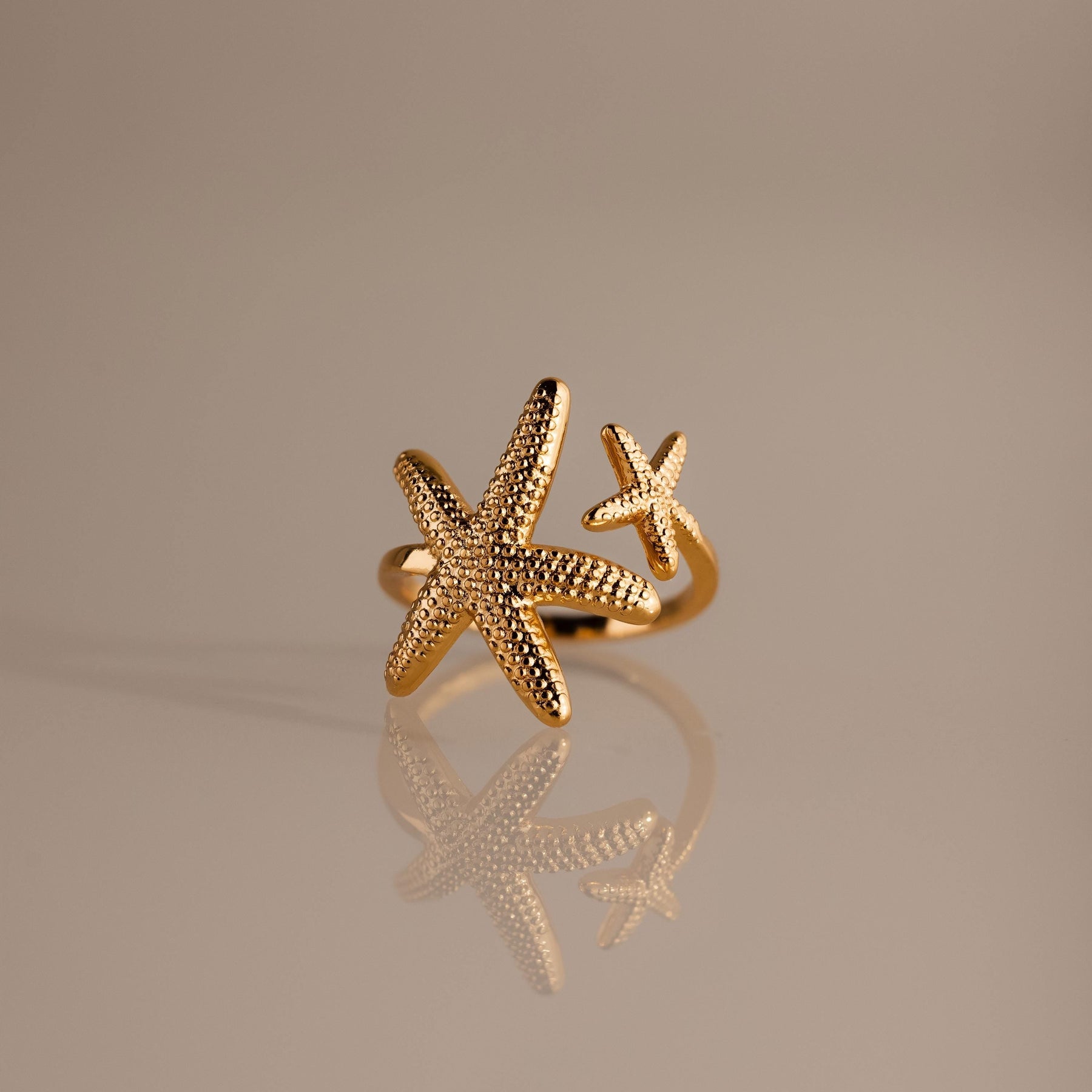 Anel de estrela-do-mar duplo aberto